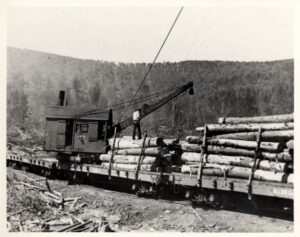 Log Loader Loading Flat Cars